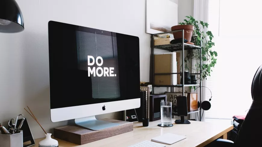 computer screen with text reading "Do More"