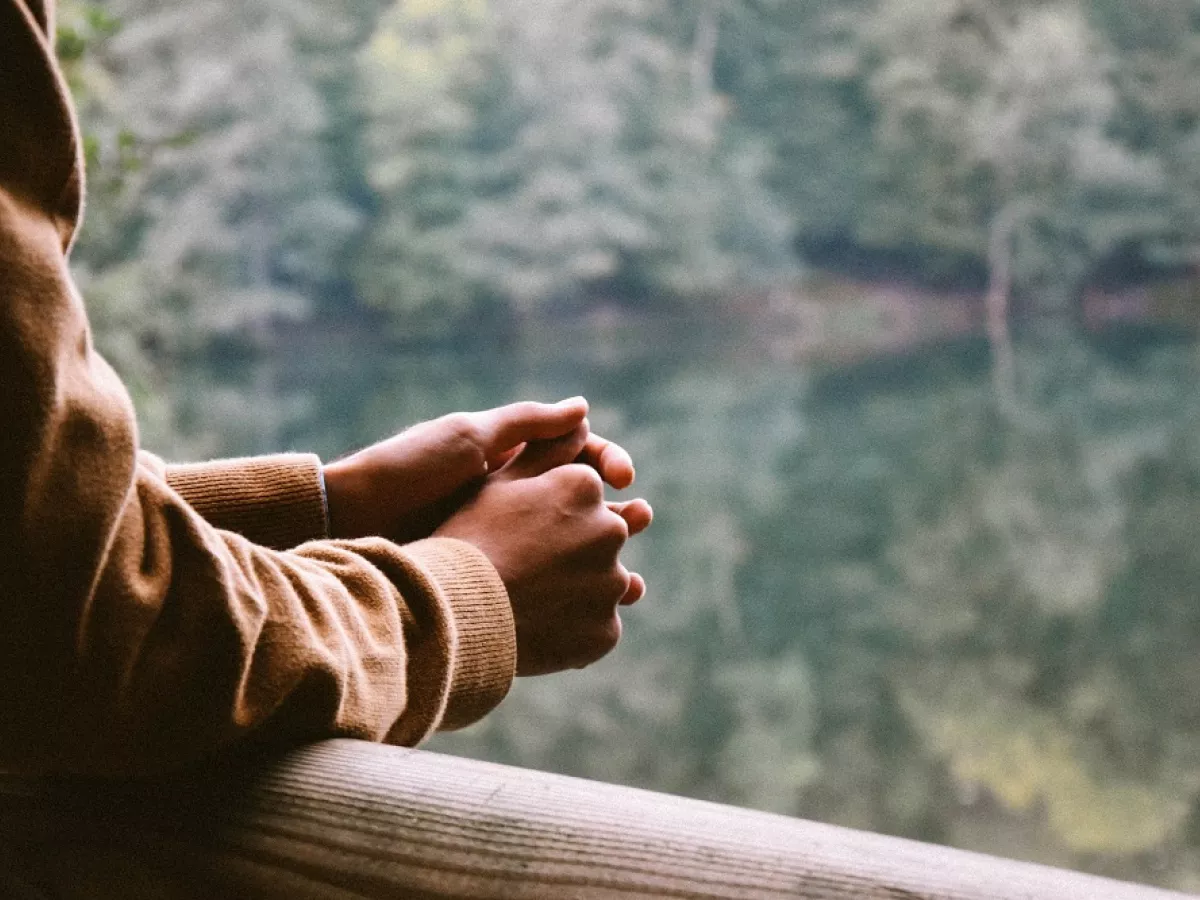 Clasped hands that give a worried feeling