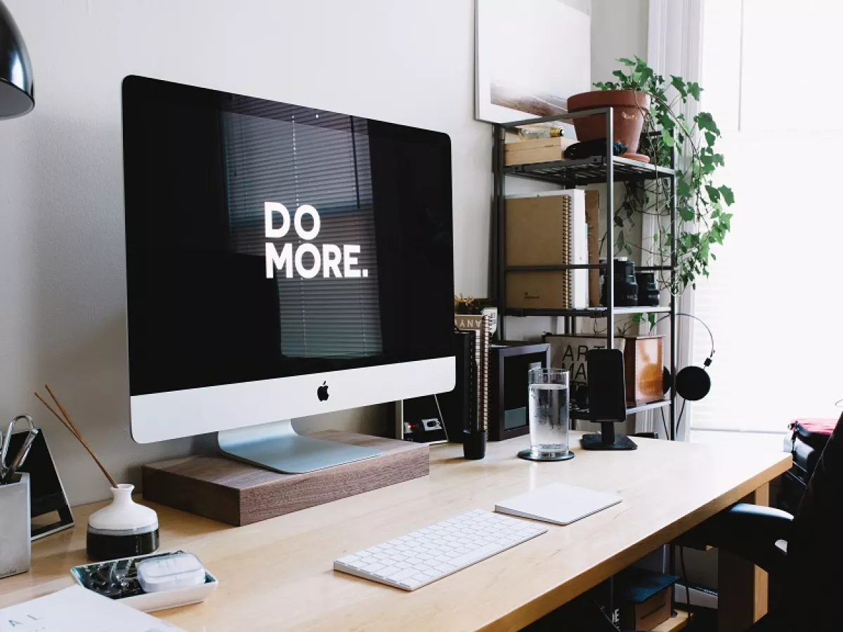 computer screen with text reading "Do More"