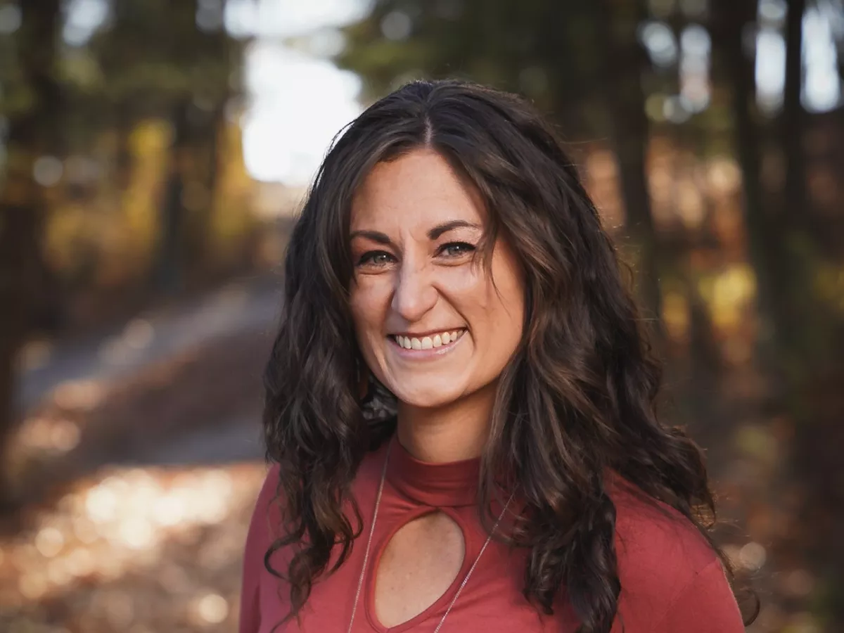 Smiling woman with long dark hair