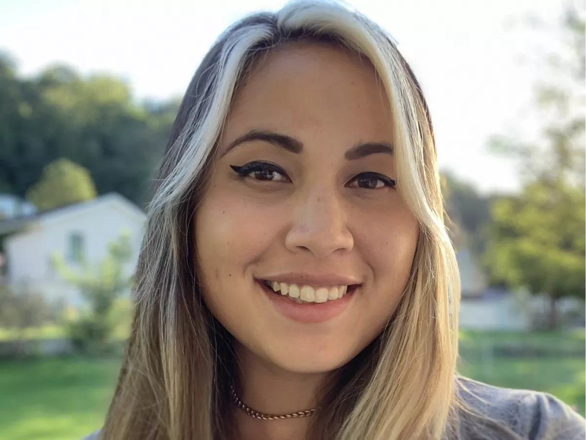 Smiling woman with long hair